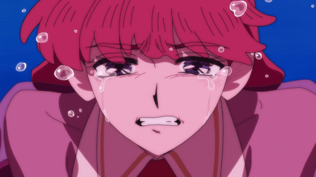 A close-up of a character with pink hair, tears streaming down their face, expressing deep emotion, surrounded by bubbles in a blue underwater setting.
